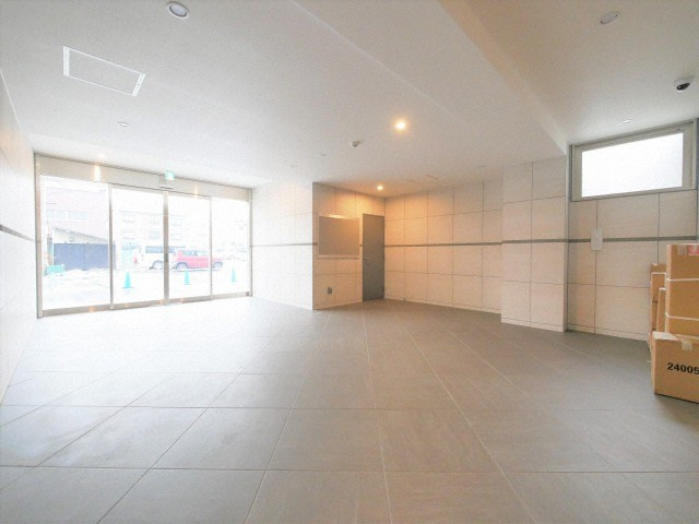 大阪市淀川区木川西１丁目の賃貸マンションのロビー