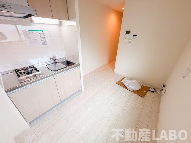 ハーモニーテラス平野西IIの居間・リビング