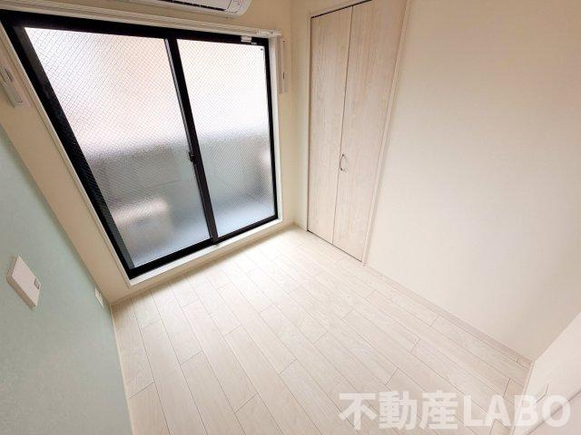 ハーモニーテラス平野西IIの寝室