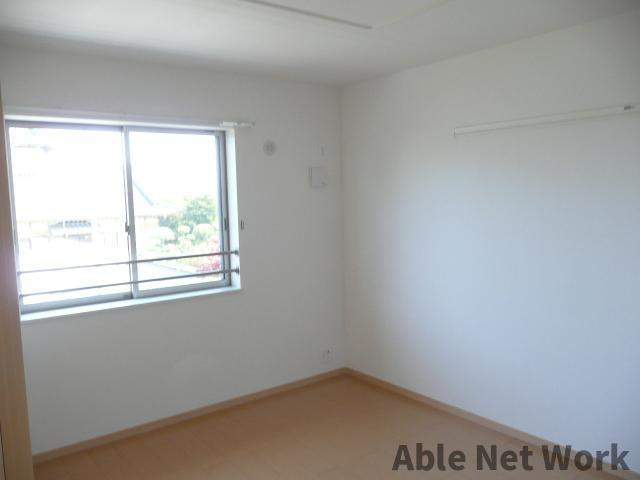 シャルムメゾンの居間・リビング|６帖洋室