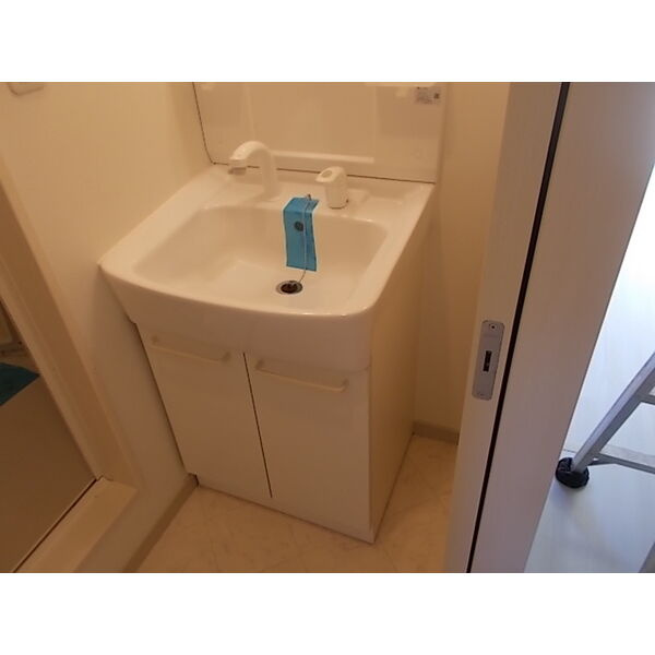 エスポワールの洗面所|別部屋同間取りのお写真となります。参考にご覧くださいませ。