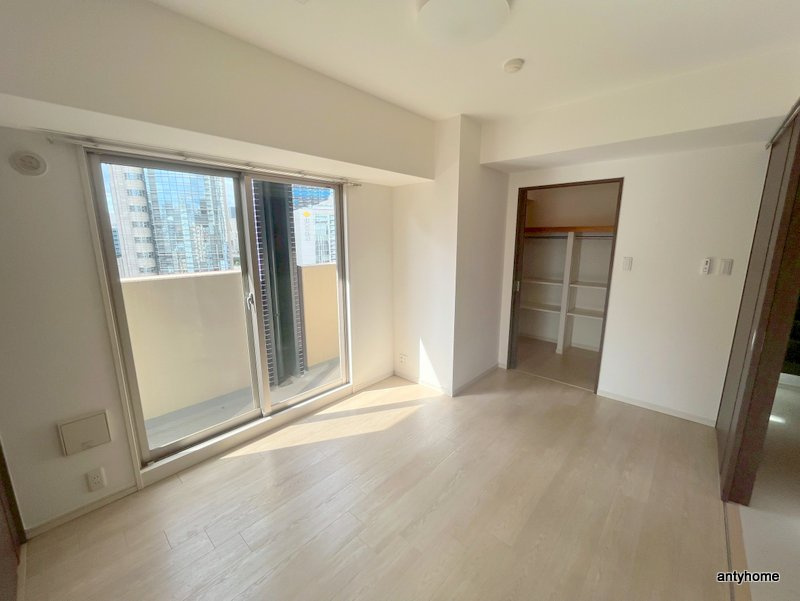 カスタリアタワー肥後橋　仲介手数料無料の寝室