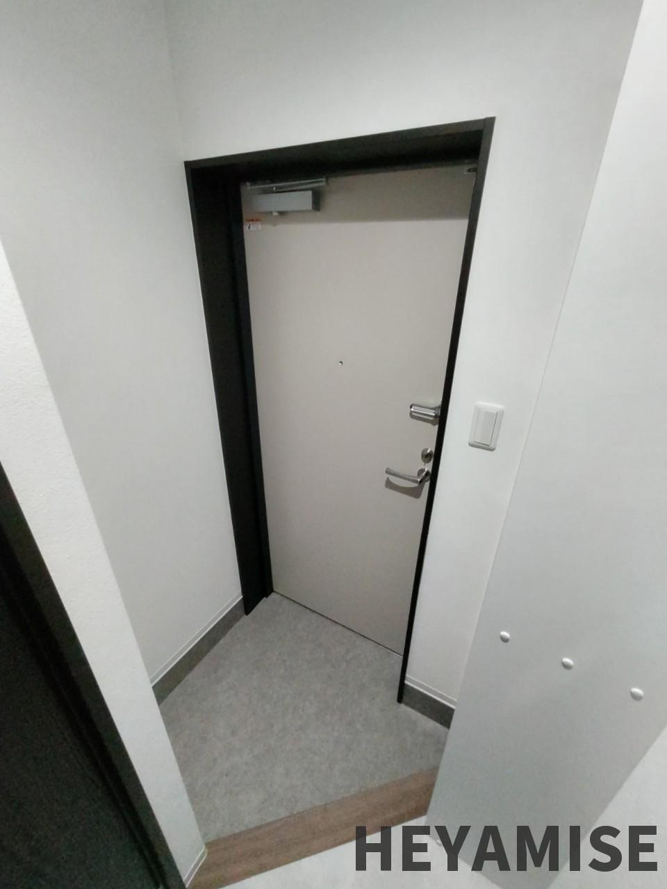 コ・クーン八幡の玄関