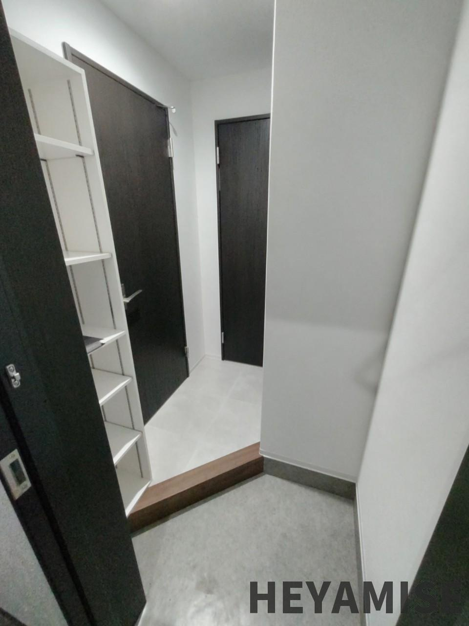 コ・クーン八幡の玄関