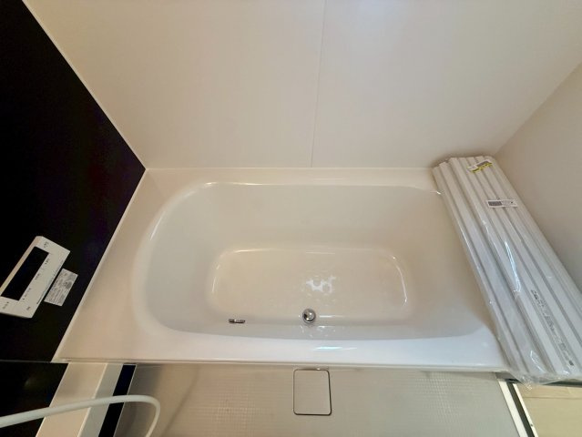 クレイドルガーデン宜野座村漢那 第２・３号棟の浴室|追い焚き機能付きのバスタブ