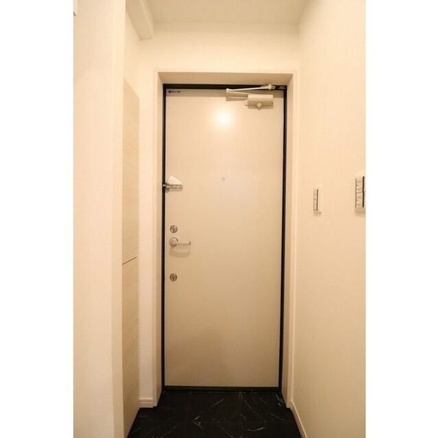 ウェルスクエア豊島千川の玄関