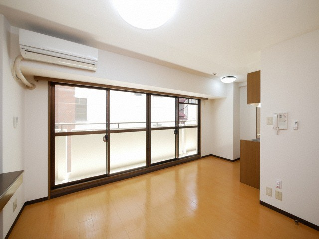 大阪市淀川区西宮原２丁目の賃貸マンションの居間・リビング