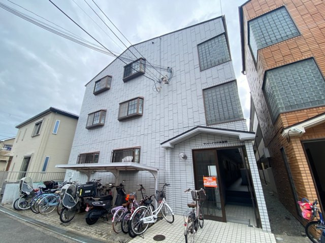 サンハイツ沢良宜西の外観