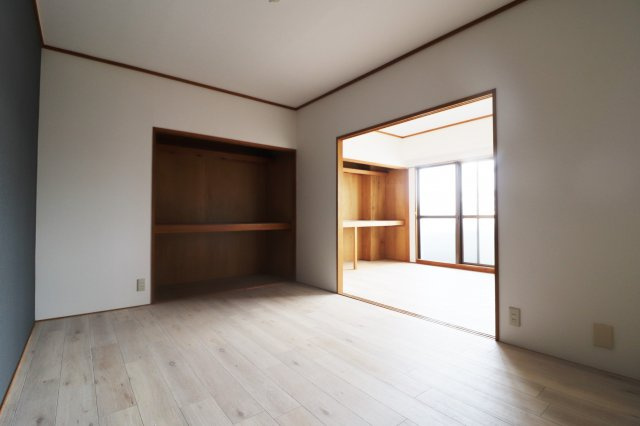 サンハイツ沢良宜西の寝室