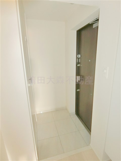 クオリタス蒲田の玄関