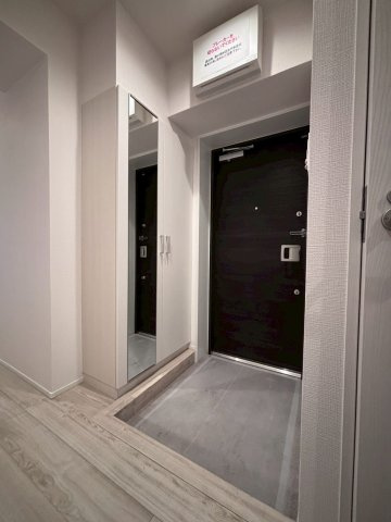 北弐十条マンションC棟の玄関