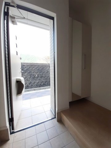 プレステージ花ずいＧの玄関