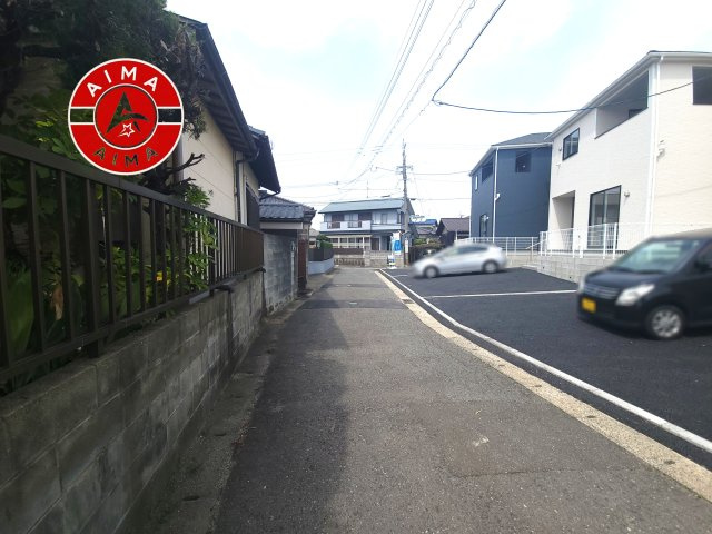 那珂川市今光8丁目第2-3棟（1号棟）の外観|前面道路含む現地の写真です。