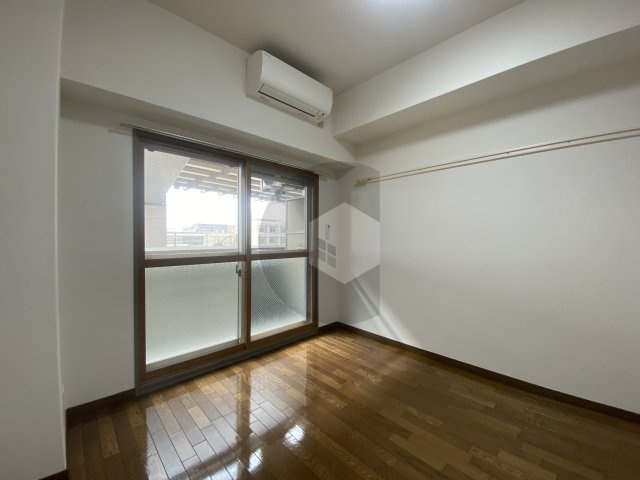 グランドオーク高井田の寝室