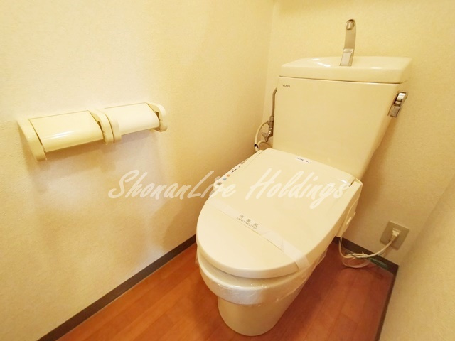 平塚市明石町の賃貸マンションのトイレ