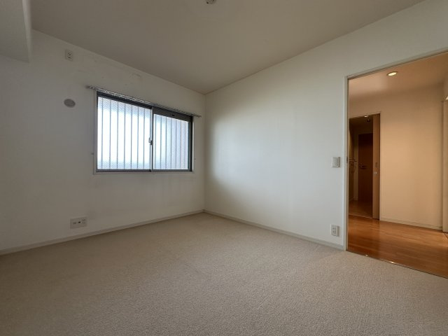 ワコーレ明石アルベージュの洋室