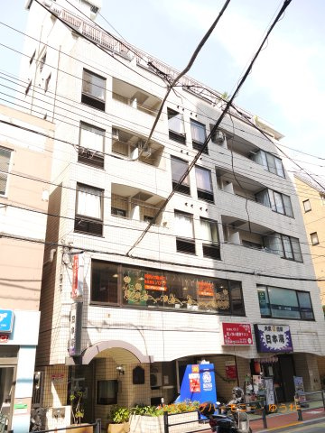 【外観】 | グローリア駒込 | モダンでスタイリッシュな印象を与えるライトグレーを基調とした外観。