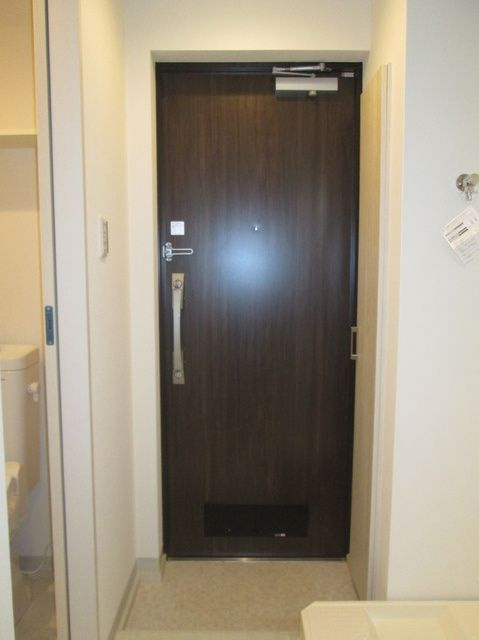 ラフィネ芦花公園Aの玄関