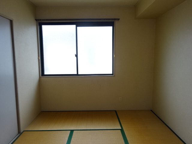 グランドール谷田川の寝室