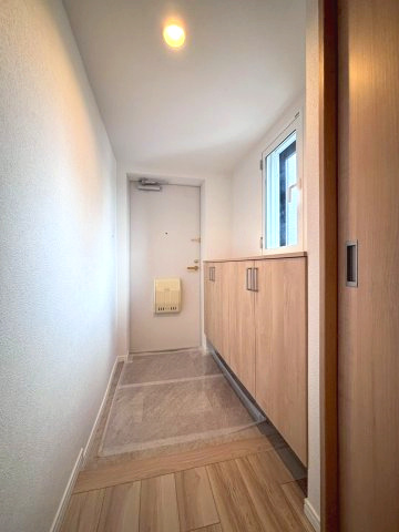 ガーデンヒルズラモード白石ステーションの玄関