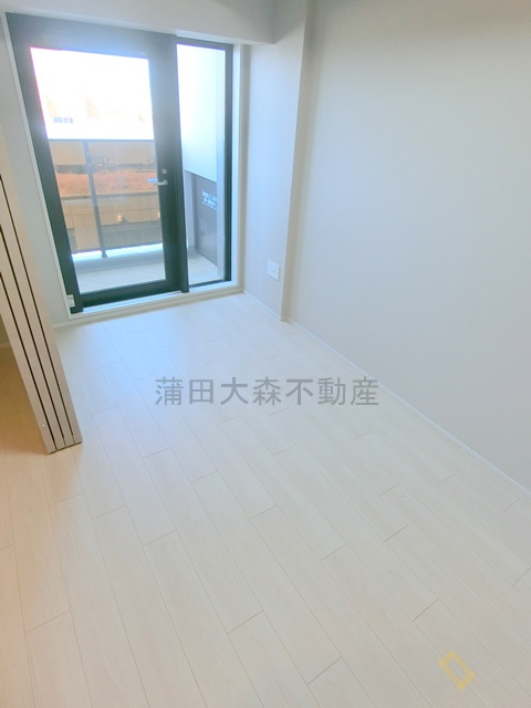 ザ・ライオンズフォーシア蒲田の居間・リビング