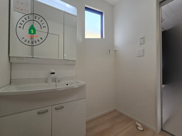 那珂川市今光8丁目第2-3棟（2号棟）の内観：施工例|脱衣所、洗面所は小さなプライベートスペース。歯磨き、洗顔と毎日施す個人空間。