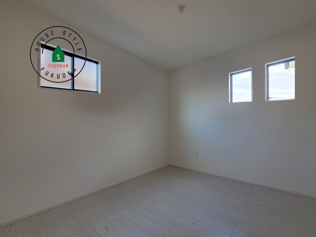 太宰府市青山1丁目第2-1棟(1号棟)の内観：施工例|落ち着いた色調の洋室です。