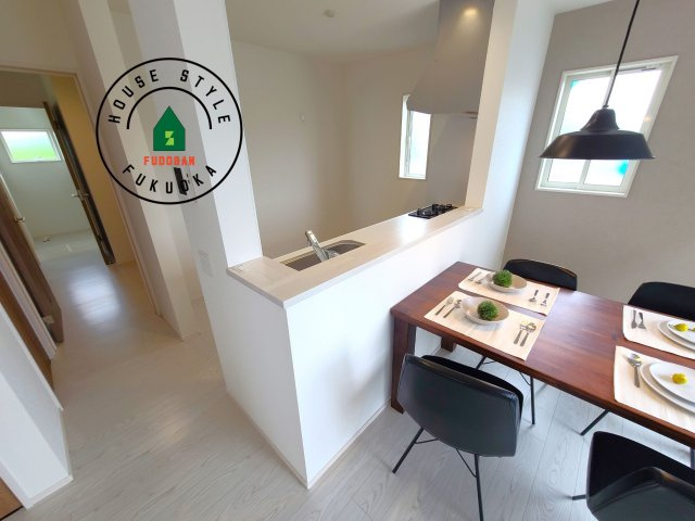 太宰府市青山1丁目第2-1棟(1号棟)の内観：施工例|キッチンから立ち込める香りが今日の料理を期待させます。