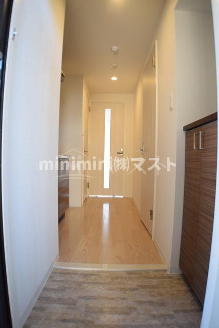 レオンヴァリエ福島野田の玄関