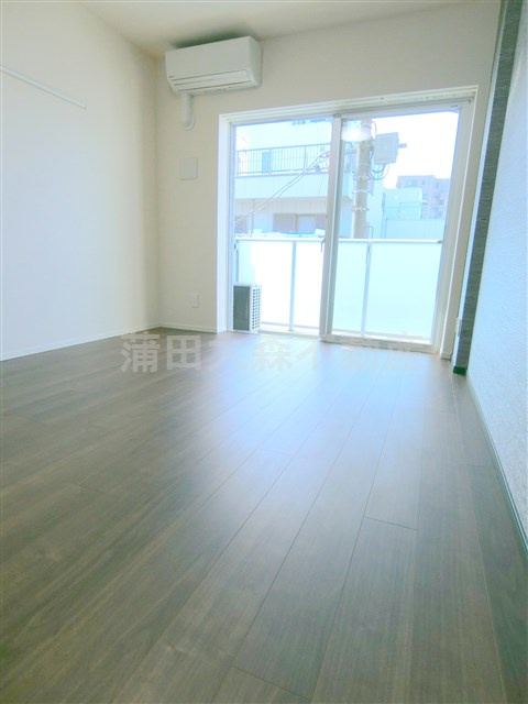 レアライズ羽田の居間・リビング