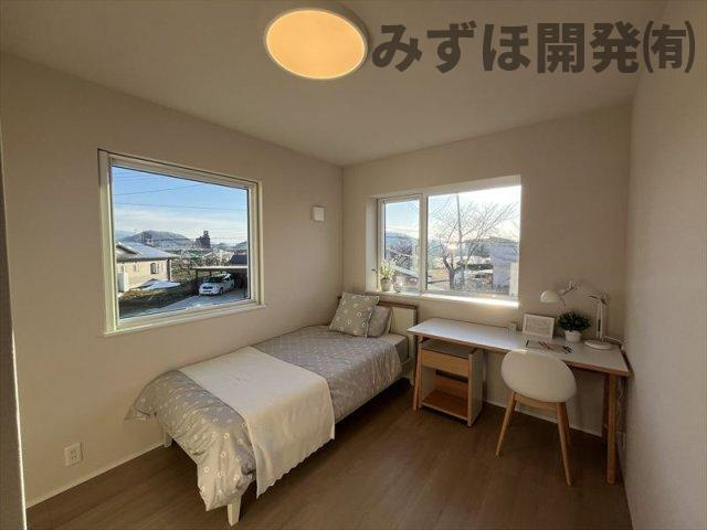 天童市大字山元1025の洋室