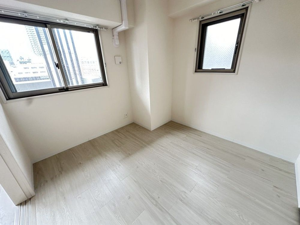 Arôme梅田の寝室