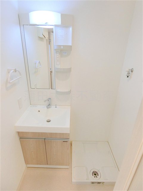 ウイングプレミア蒲田の洗面所|独立洗面台と室内洗濯機置き場　脱衣所　洗面所　トイレと洗面台も分かれた間取りが◎