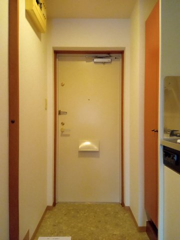 川崎市麻生区上麻生５丁目の賃貸マンションの玄関