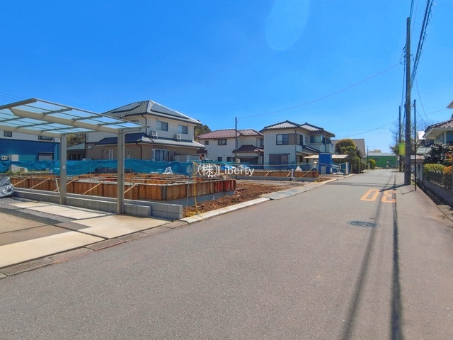 つくば市南中妻4期　新築戸建　1号棟の前面道路含む現地写真