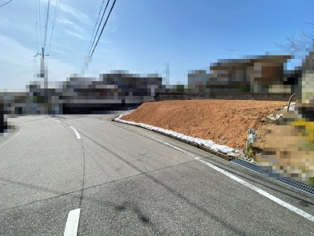 明石市大久保町高丘一丁目①号地　売土地の前面道路含む現地写真