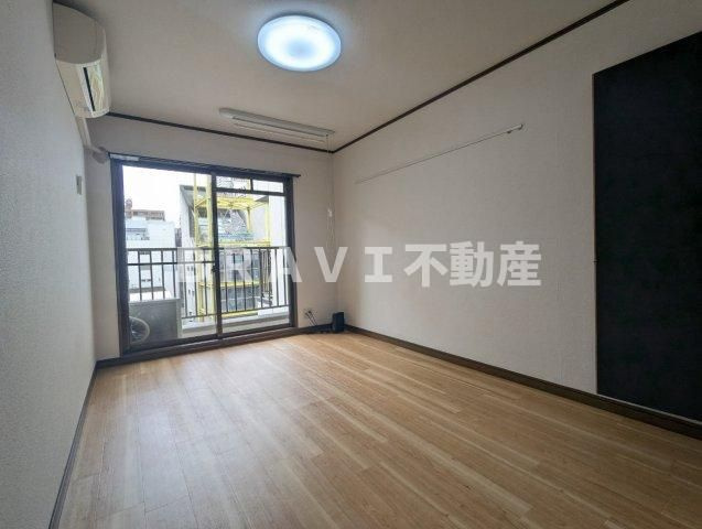 プランドール天満 BRAVI不動産の居間・リビング