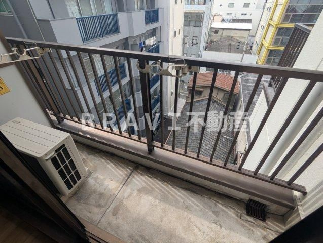 プランドール天満 BRAVI不動産のバルコニー