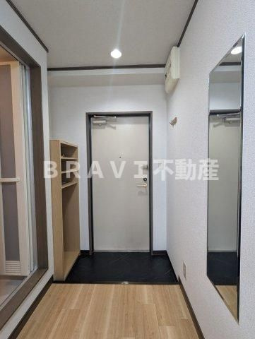 プランドール天満 BRAVI不動産の玄関
