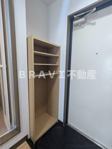 プランドール天満 BRAVI不動産の玄関
