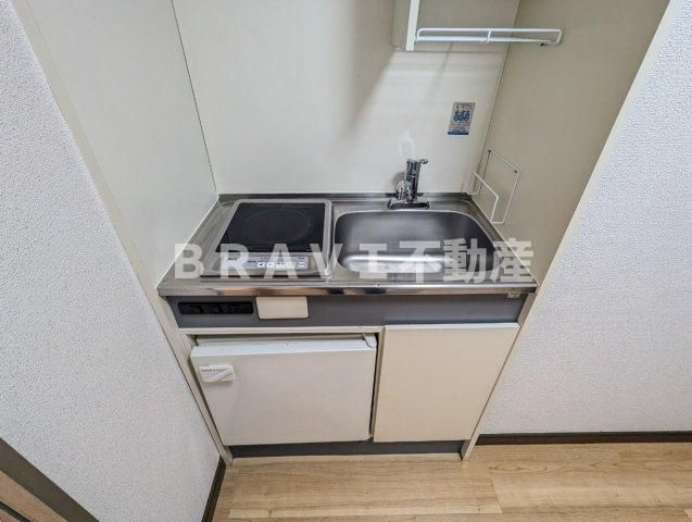 プランドール天満 BRAVI不動産のキッチン