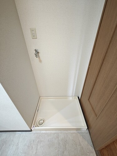 ライオンズシティ豊田の洗面所|室内洗濯機置場