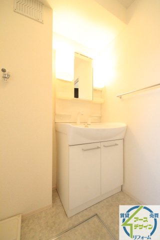 グランドアトリオ神戸西C棟の洗面所|※パース写真