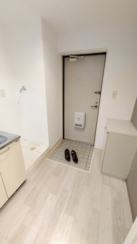 サンライズ伴駅前ビルの玄関