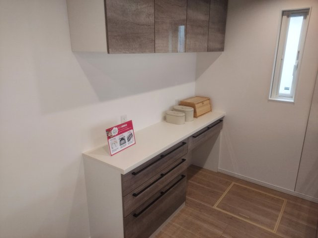 宝塚市宝梅2丁目新築一戸建1号棟のキッチン|カップボード