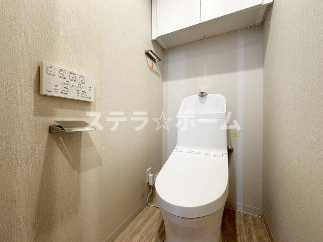 千里緑丘第壱七号棟のトイレ|落ち着いた色調のトイレです