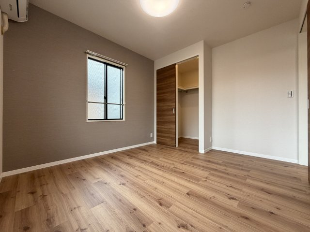 パールタウン岩田４３の寝室