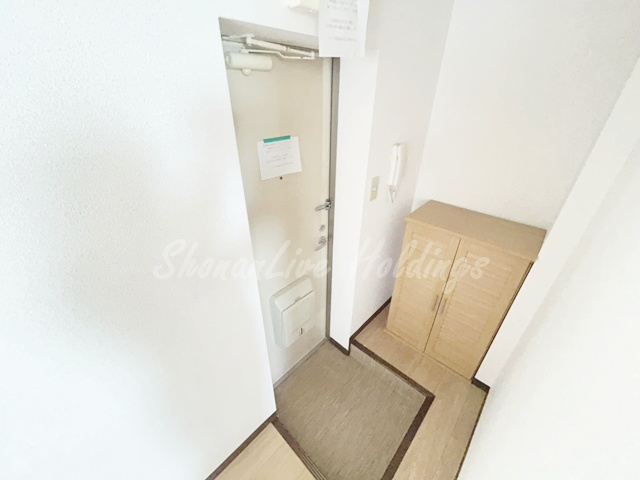 藤沢市片瀬海岸１丁目の賃貸マンションの玄関