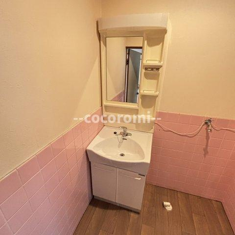 香里園東之町車庫付貸家の洗面所