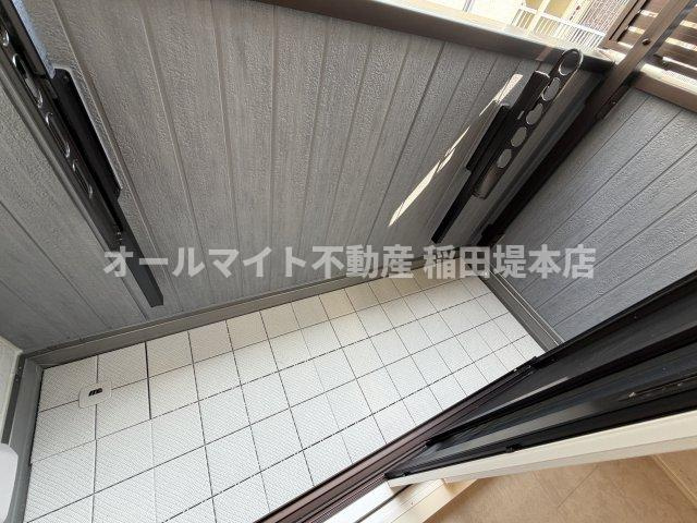 川崎市多摩区宿河原５丁目のアパートのバルコニー